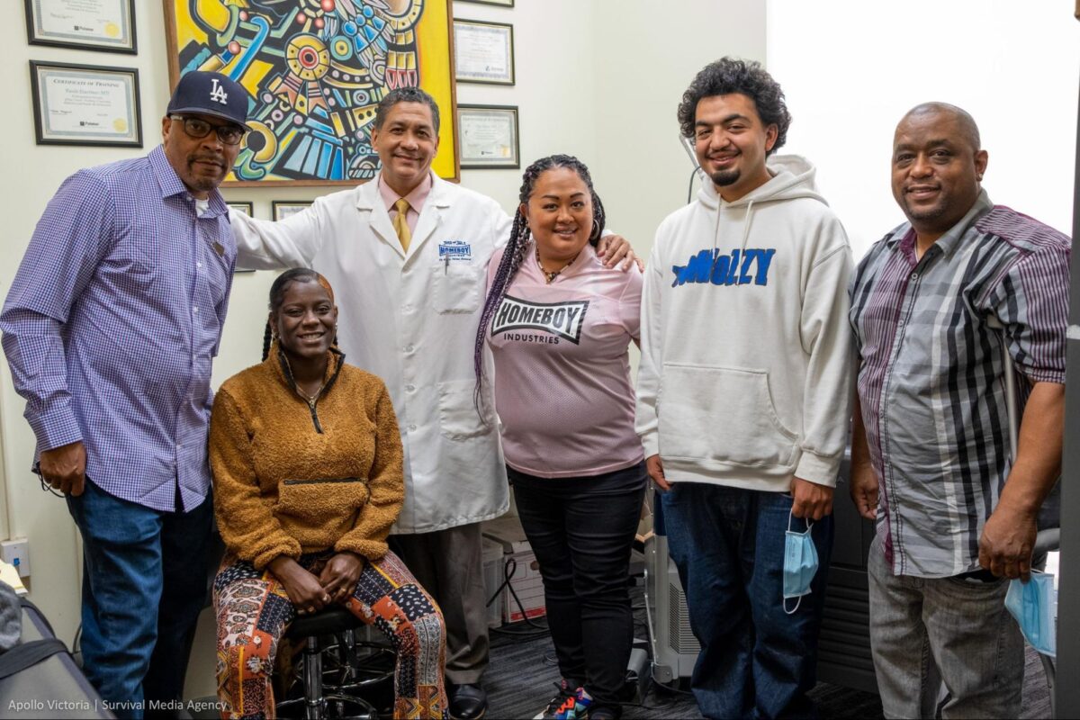 Maria Luna stands with fellow colleagues and community members at Homeboy Industries.