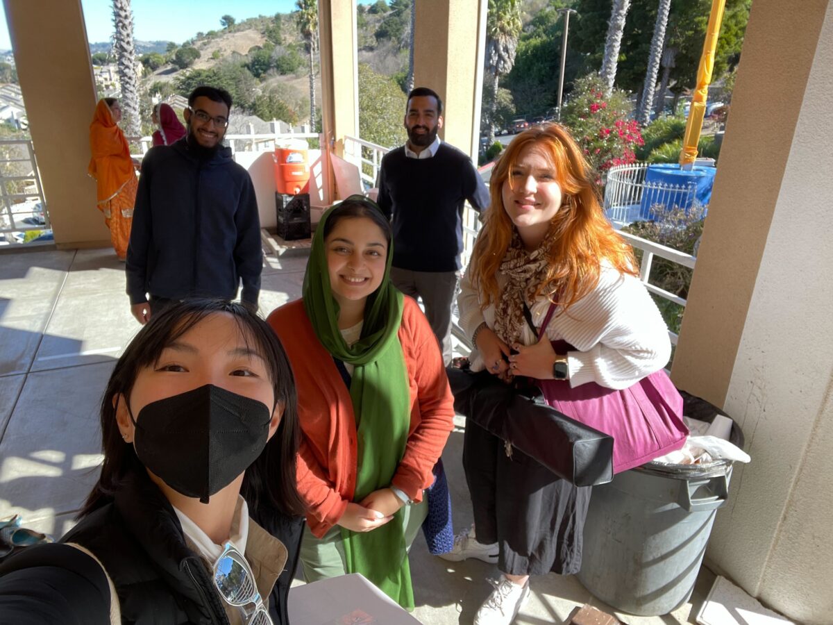 5 ALC staff members taking a selfie at Gurdwara Sahib El Sobrante during outreach.